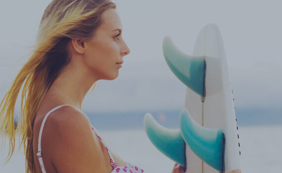 female surfing